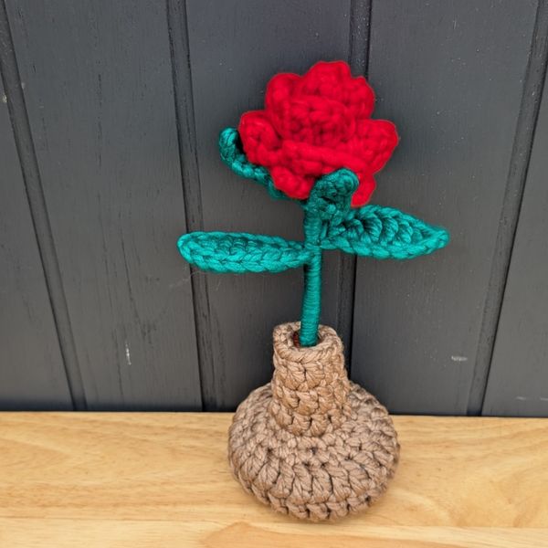 Red Rose Plant in a Cream Stuffed Vase